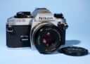 Nikon FG-20 35mm SLR Film Camera Nikon 50mm f/1.8 AIs Series E Lens * Excellent