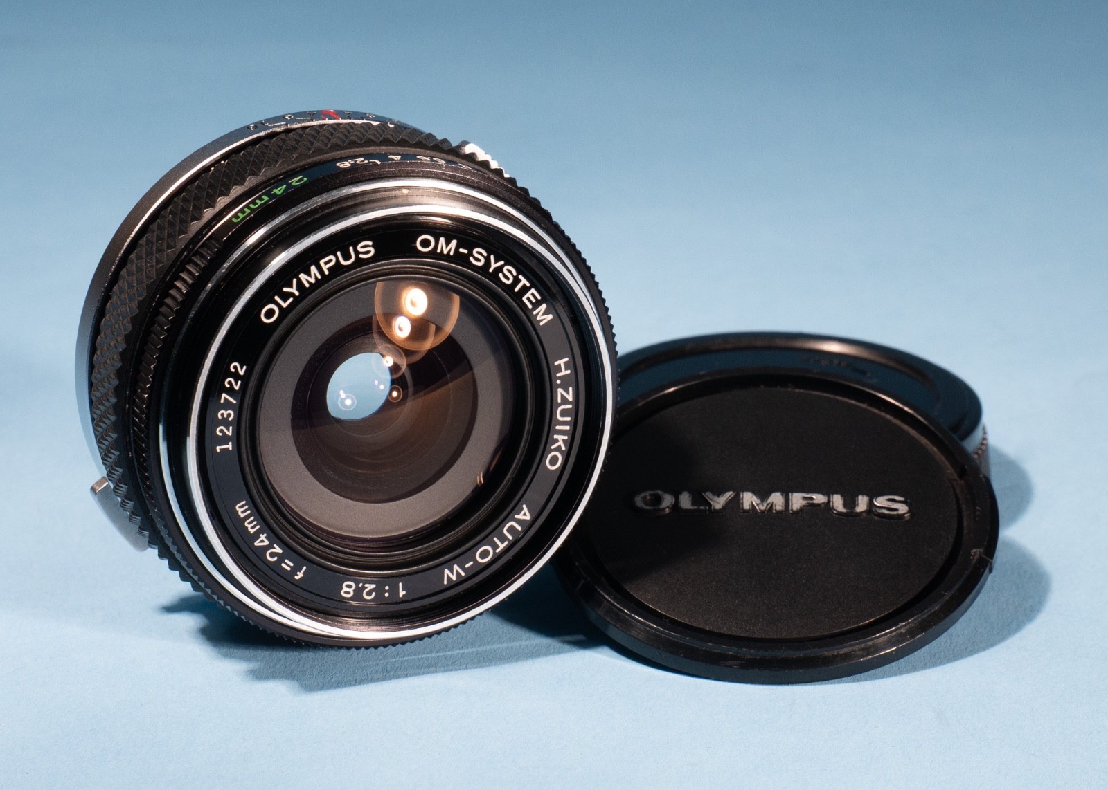 Olympus-OM-24mm-f28-H-Zuiko-Auto-W-Prime-Lens-Fully-Working-Excellent-137439482387